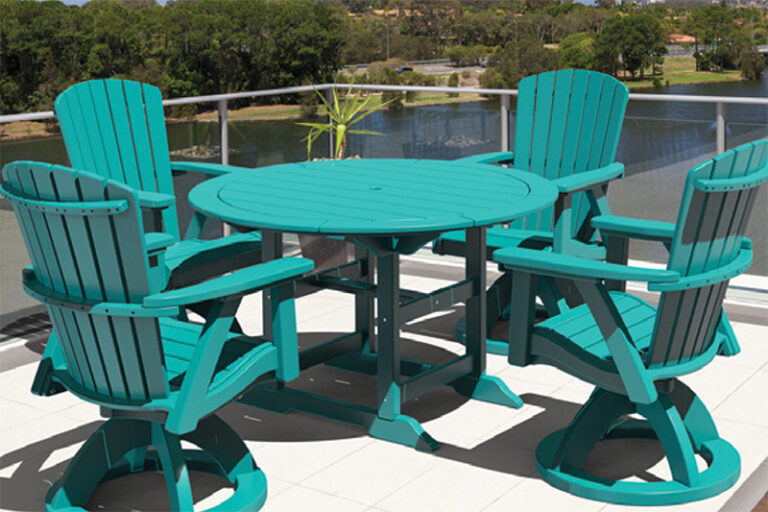 Teal poly outdoor furniture pictured on deck overlooking lake