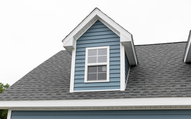 Blue and white dormer with window