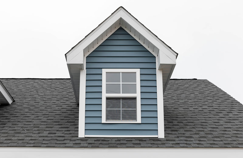 Blue and white dormer with window