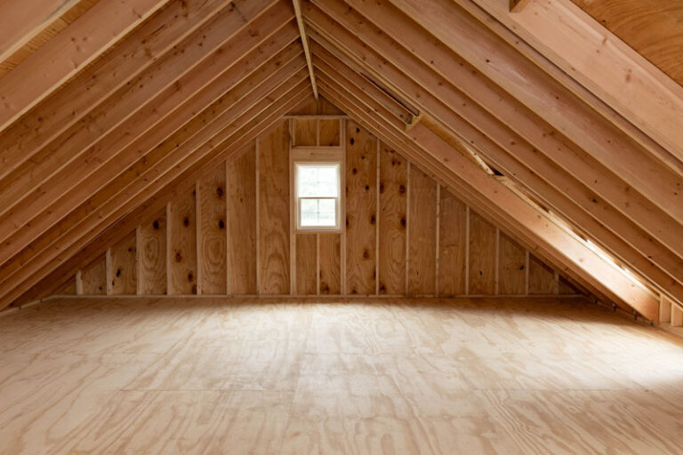 Attic truss storage in 2 car Amish built garage.