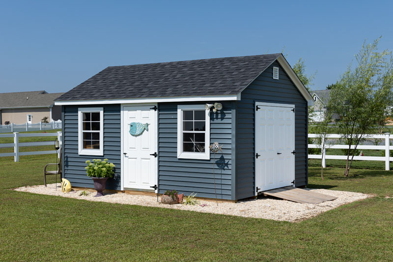 Blue & white Amish made storage shed.