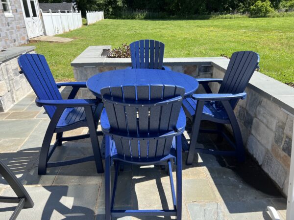 Blue Amish crafted poly dining set on stone patio