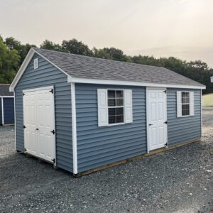 Amish built blue and white storage shed for sale in Denton, MD