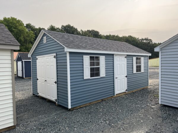 Amish built blue and white storage shed for sale in Denton, MD