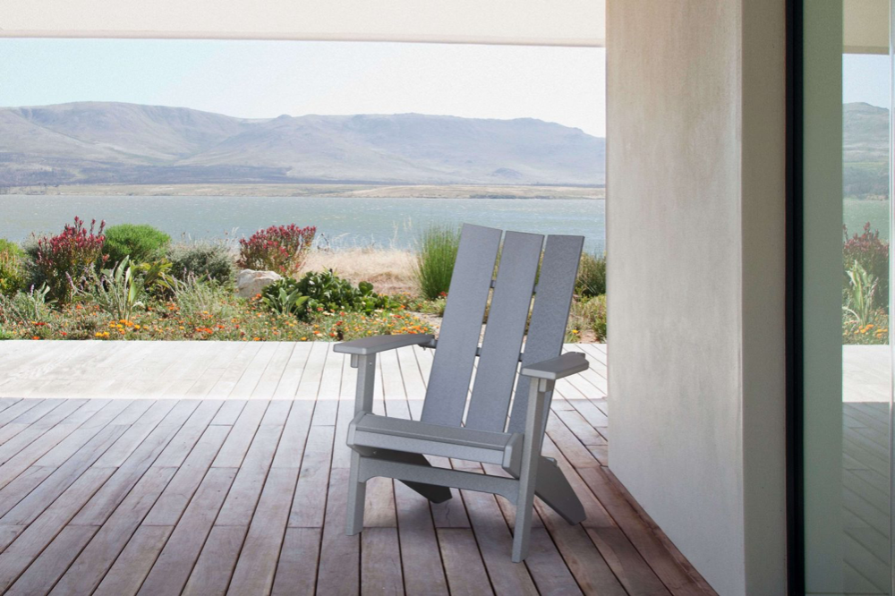 Parc Adirondack chair on deck with lake and mountains in background