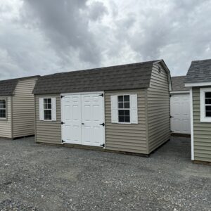Clay mini barn with white doors for sale in Denton, MD