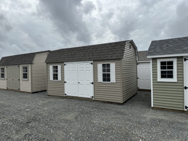 Clay mini barn with white doors for sale in Denton, MD