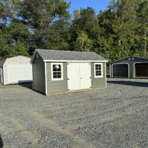 Green and white storage shed for sale in Denton, MD