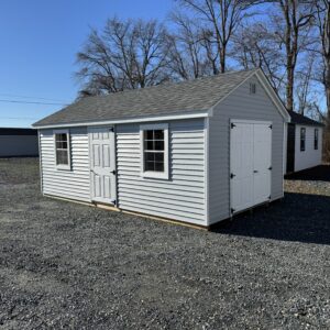 Gray and white storage shed for sale in Denton, MD
