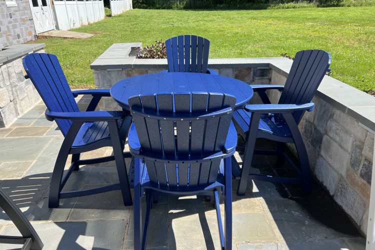 Blue Amish crafted poly dining set on stone patio