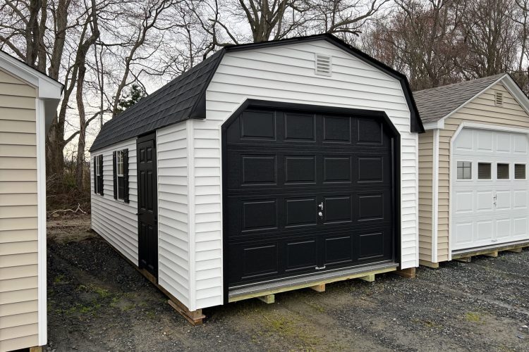 A black and white storage shed