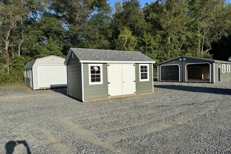 Green and white storage shed for sale in Denton, MD