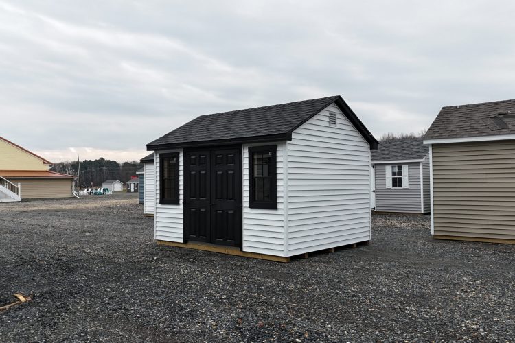 Small black and white garden shed for sale in Denton, MD